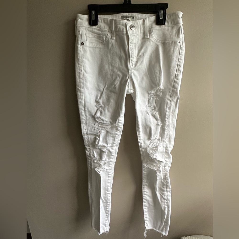 Abercrombie and Fitch, white low rise distressed skinny jeans with holes